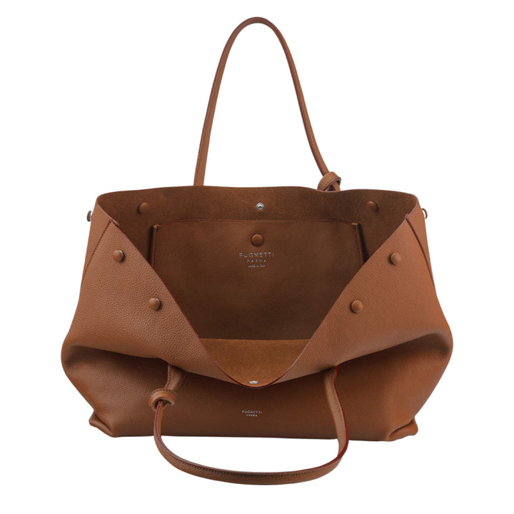 Open brown leather handbag with multiple compartments and button details