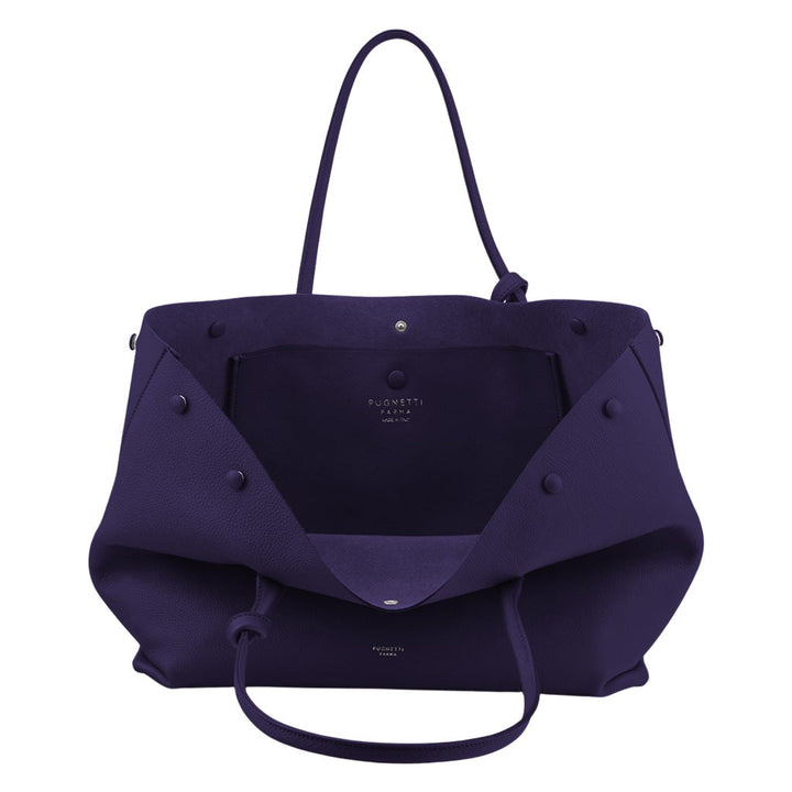 Deep purple leather tote bag with open front pocket and silver stud details