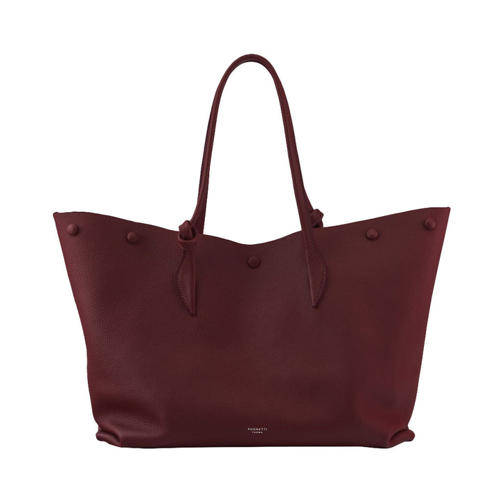 Maroon leather tote bag with button accents and shoulder straps