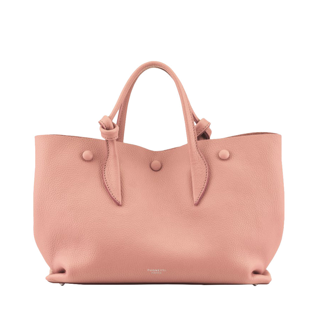 Pink leather handbag with textured finish and dual handles