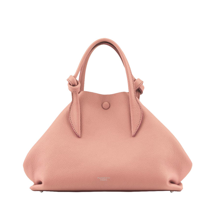 Pink leather handbag with short handles and a button closure