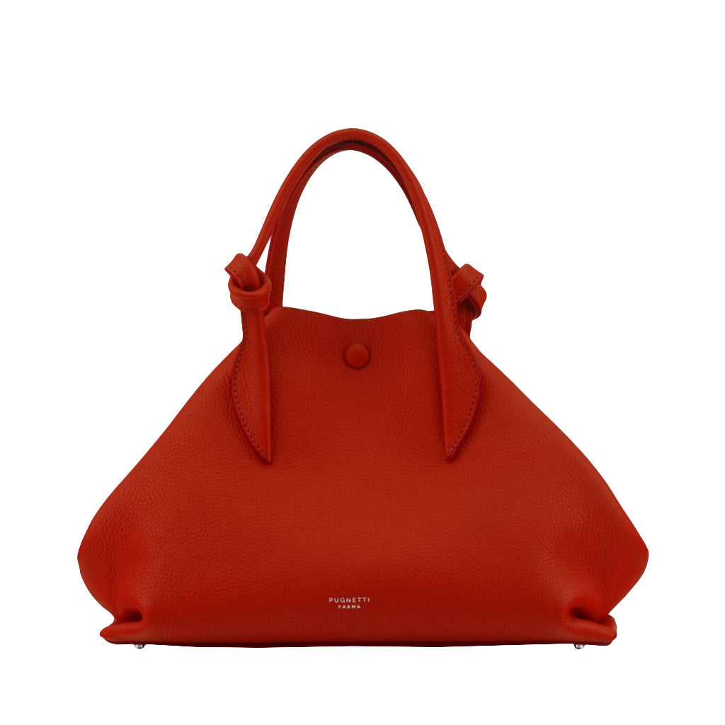 Stylish red leather handbag with handles and button closure