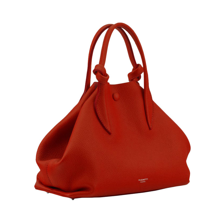 Red leather handbag with double handles and a minimalist design