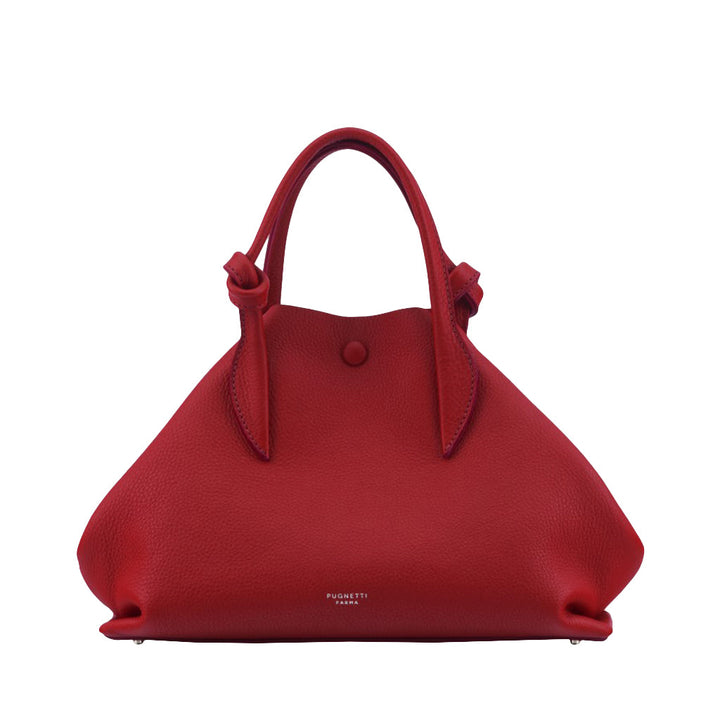 Red leather designer handbag with top handles and knot details