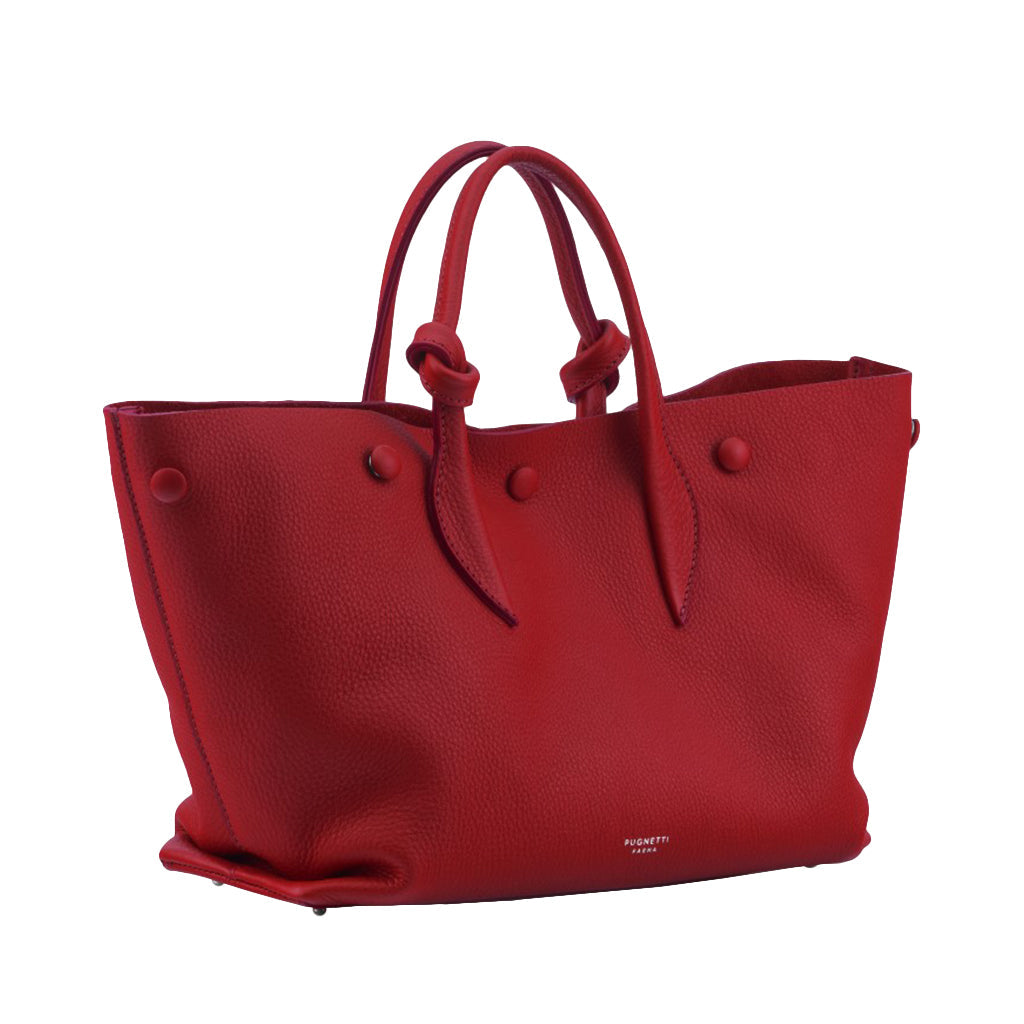 Red leather tote bag with handles and small branding detail