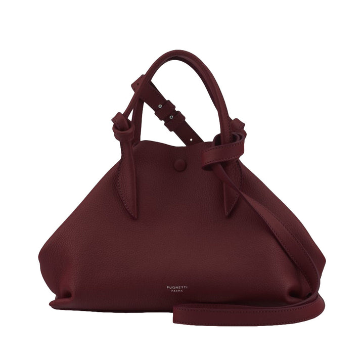 Elegant burgundy leather handbag with top handles and shoulder strap