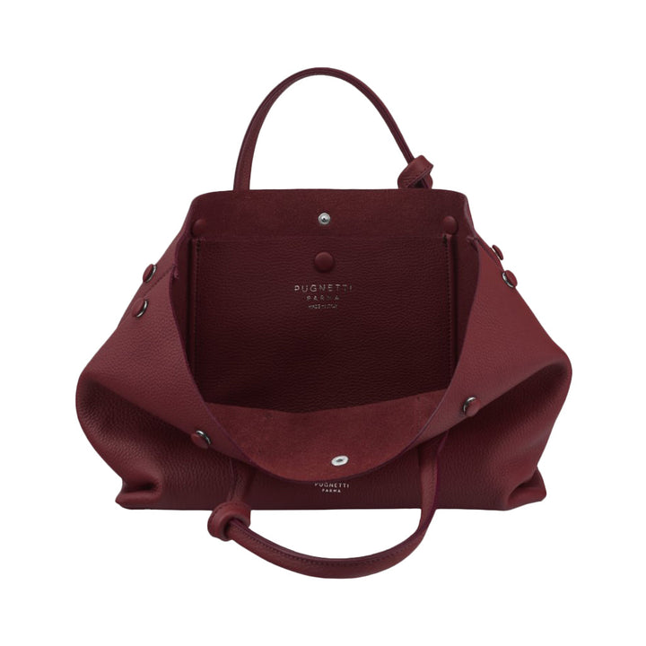 Elegant maroon leather handbag with open interior