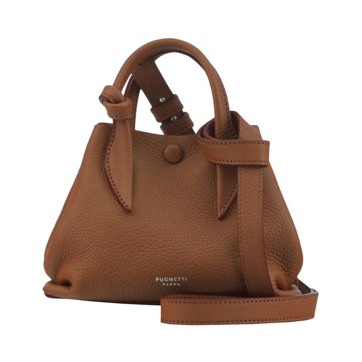 Tan leather handbag with shoulder strap and button closure by Pugnetti Parba