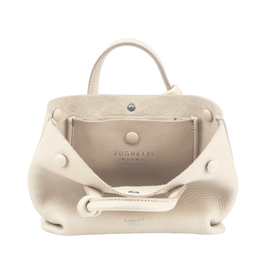 Cream leather handbag with top handles and open compartment