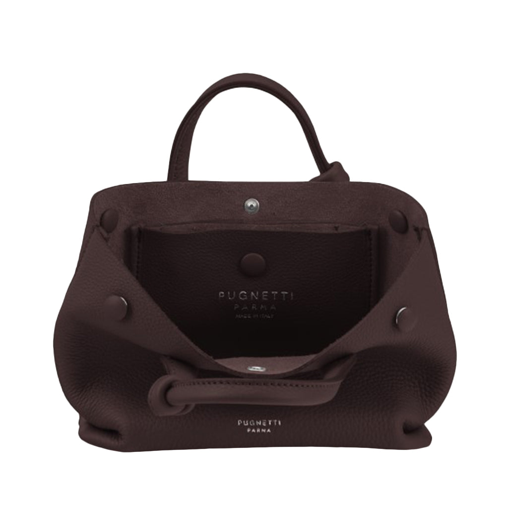 Open brown leather Pugnetti Parma handbag showcasing interior branding and snap closure