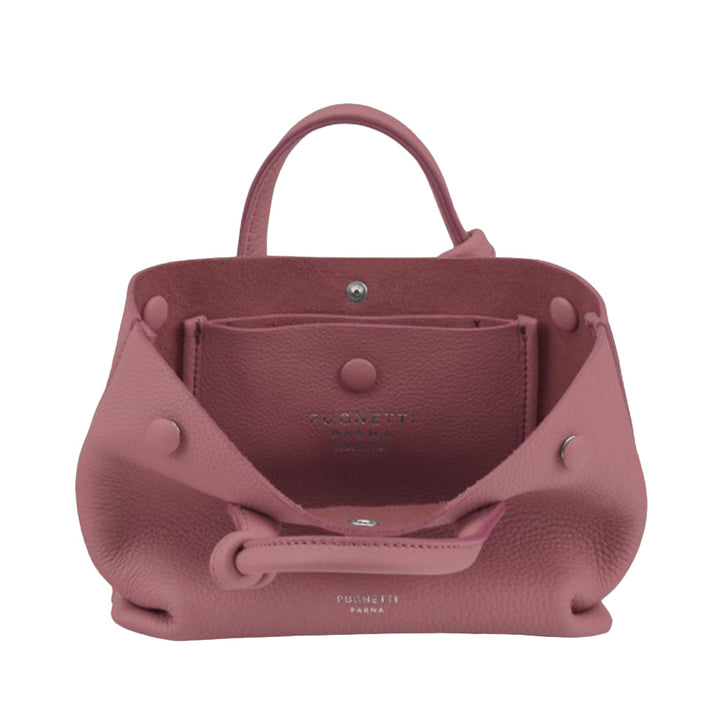 Pink leather handbag with open top and visible brand logo