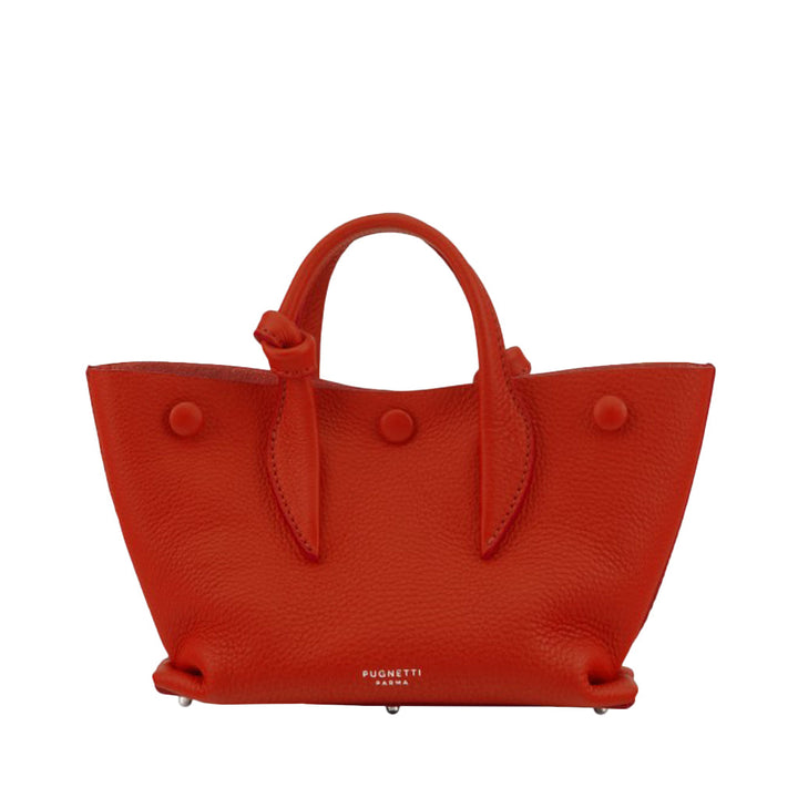 Red leather handbag with top handles and button accents