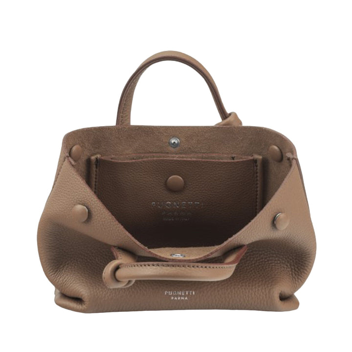 Brown leather handbag with snap closure and handle, featuring Pugneta Parma branding inside