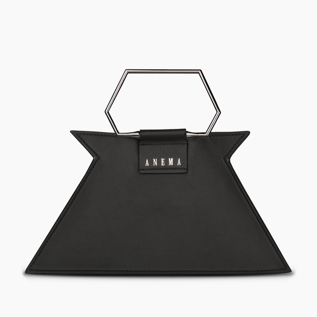 Stylish black geometric handbag with silver hexagonal handle