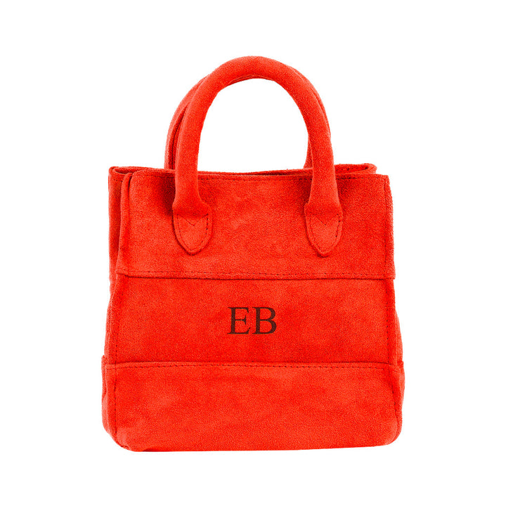 Red suede handbag with monogram EB on the front