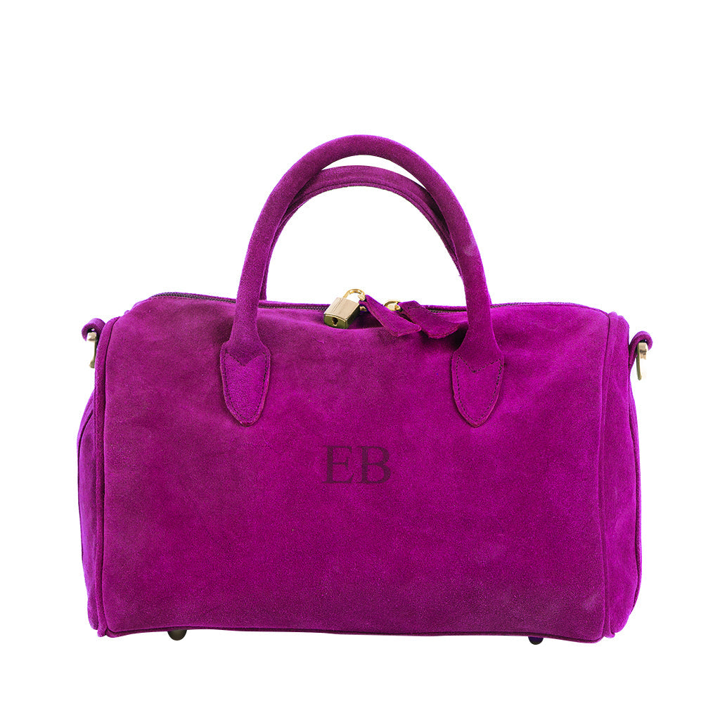 Bright purple suede handbag with embroidery and gold accents