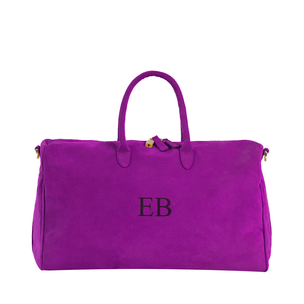 Purple suede duffel bag with monogram EB and gold hardware