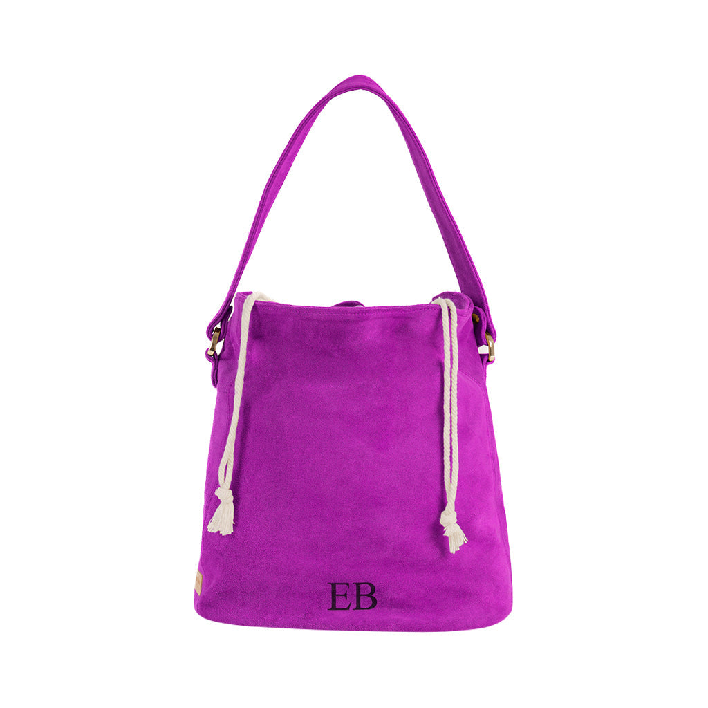 Purple suede bucket bag with shoulder strap and drawstring closure