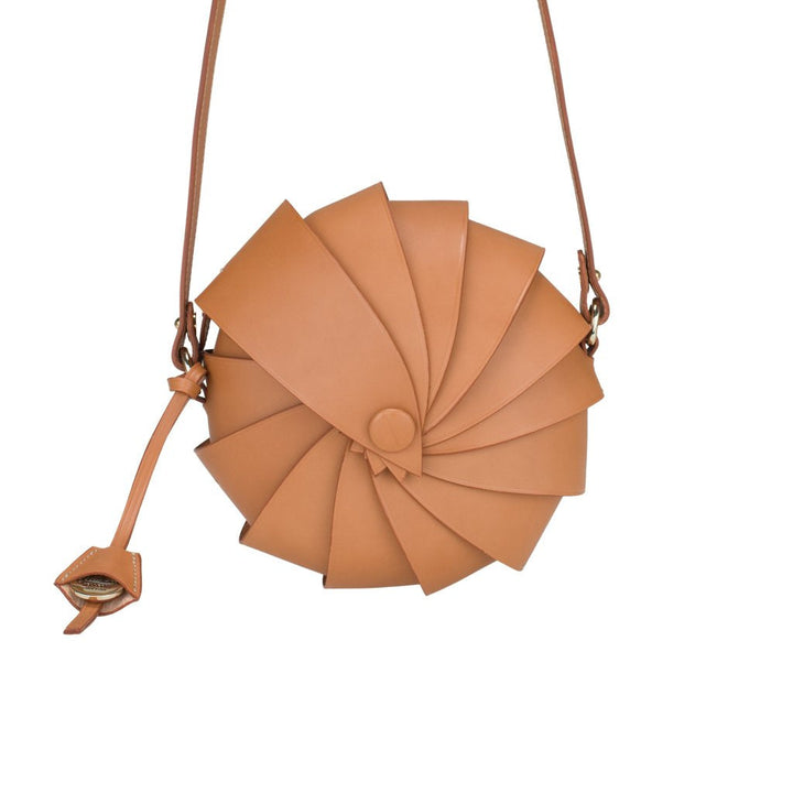 Stylish tan leather spiral design crossbody bag