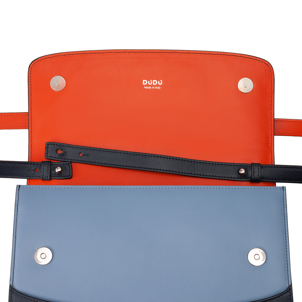 Open designer leather handbag with orange interior and blue exterior by DuDu