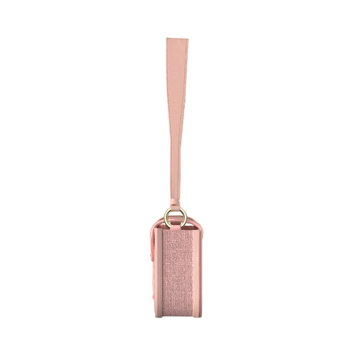 Pink leather crossbody bag with adjustable strap and gold hardware, side view