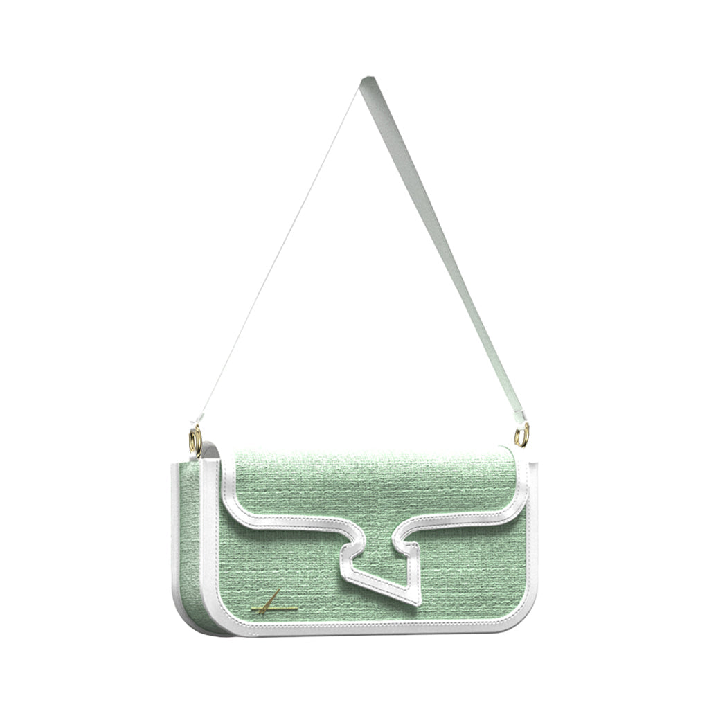 Mint green designer shoulder bag with white accents and adjustable strap