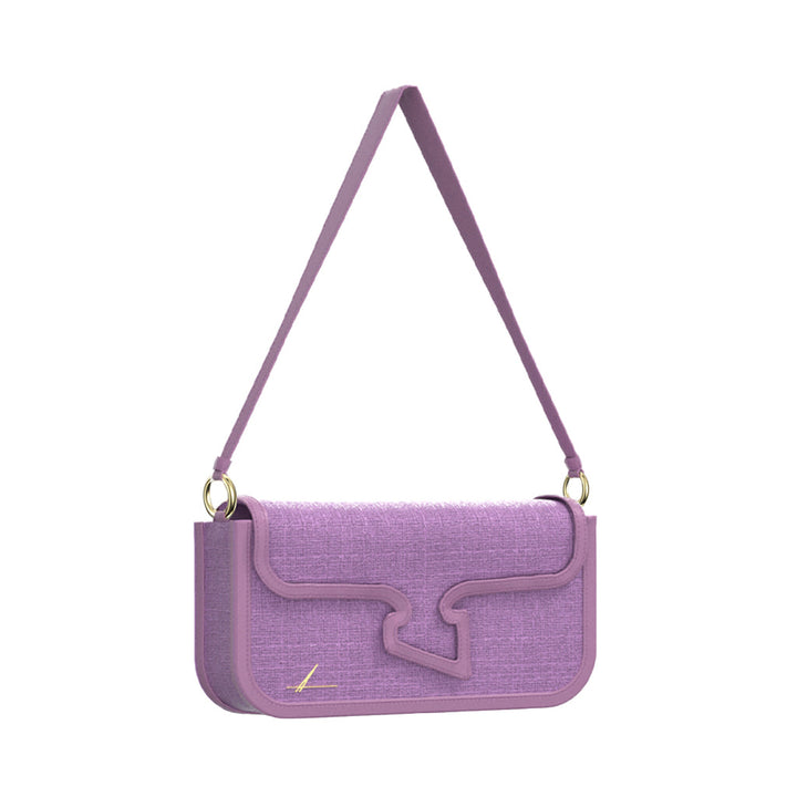 Purple designer handbag with shoulder strap