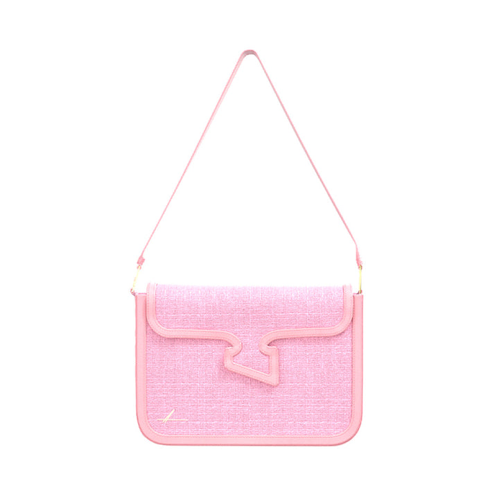 Pink shoulder bag with unique abstract flap design and thin strap