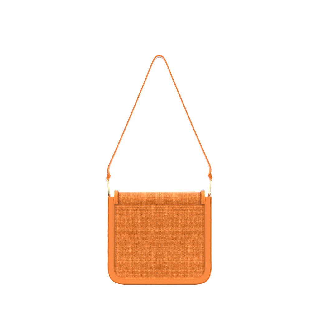 Orange leather crossbody bag with textured flap and long strap
