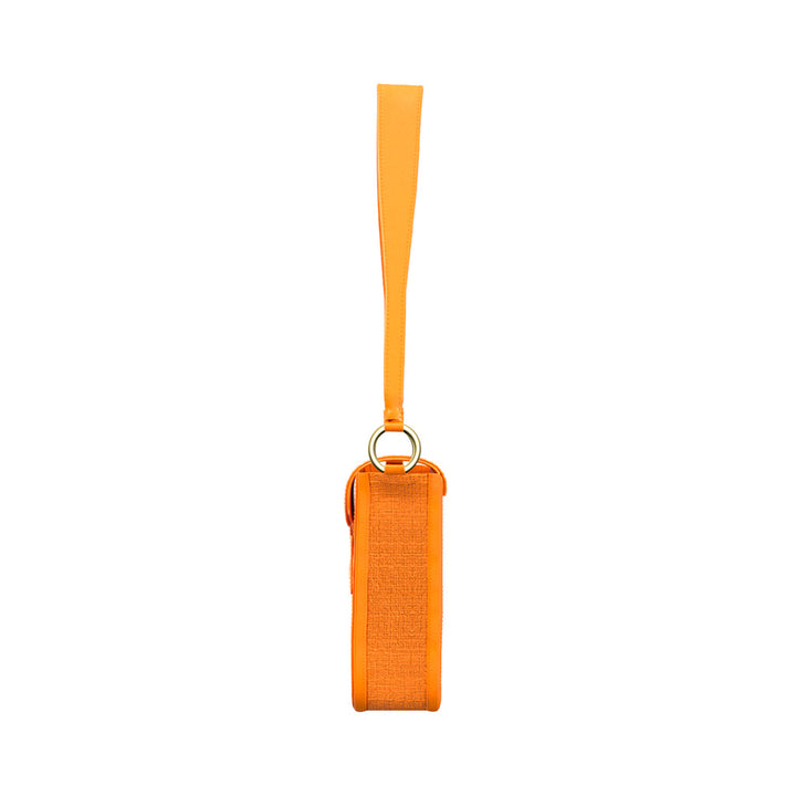 Orange wrist strap with metal ring attachment on a white background