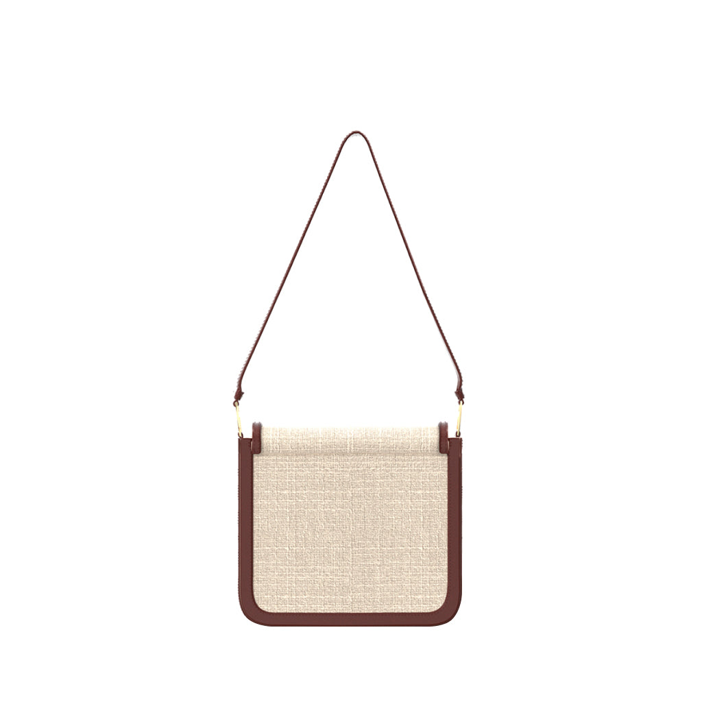 Beige and brown crossbody bag with textured fabric and adjustable strap