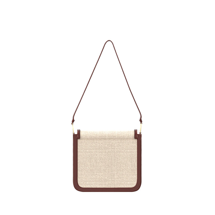 Beige and brown crossbody bag with textured fabric and adjustable strap