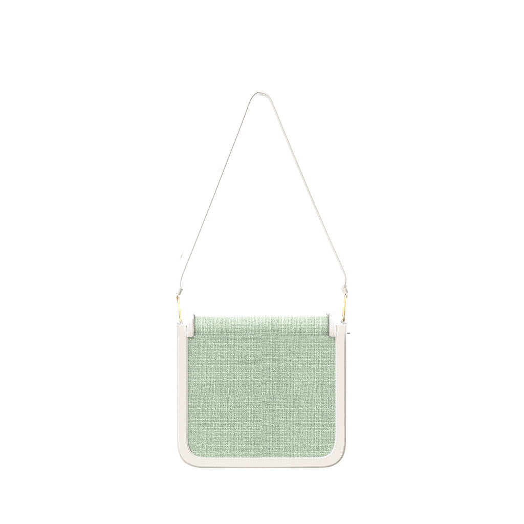 Elegant green textured handbag with white strap