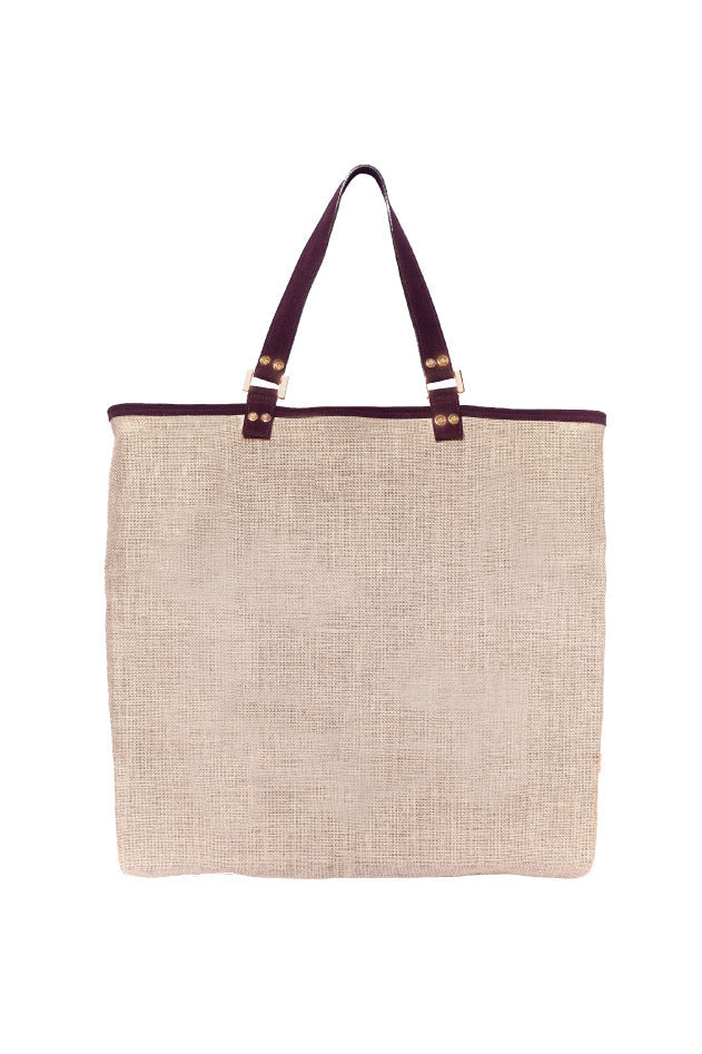 Beige jute tote bag with dark brown leather handles