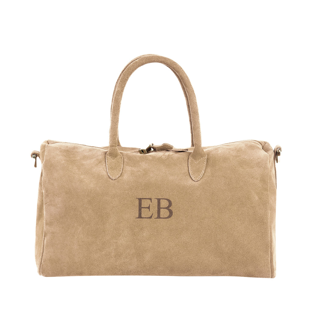 Tan suede duffel bag with embroidered initials 'EB'