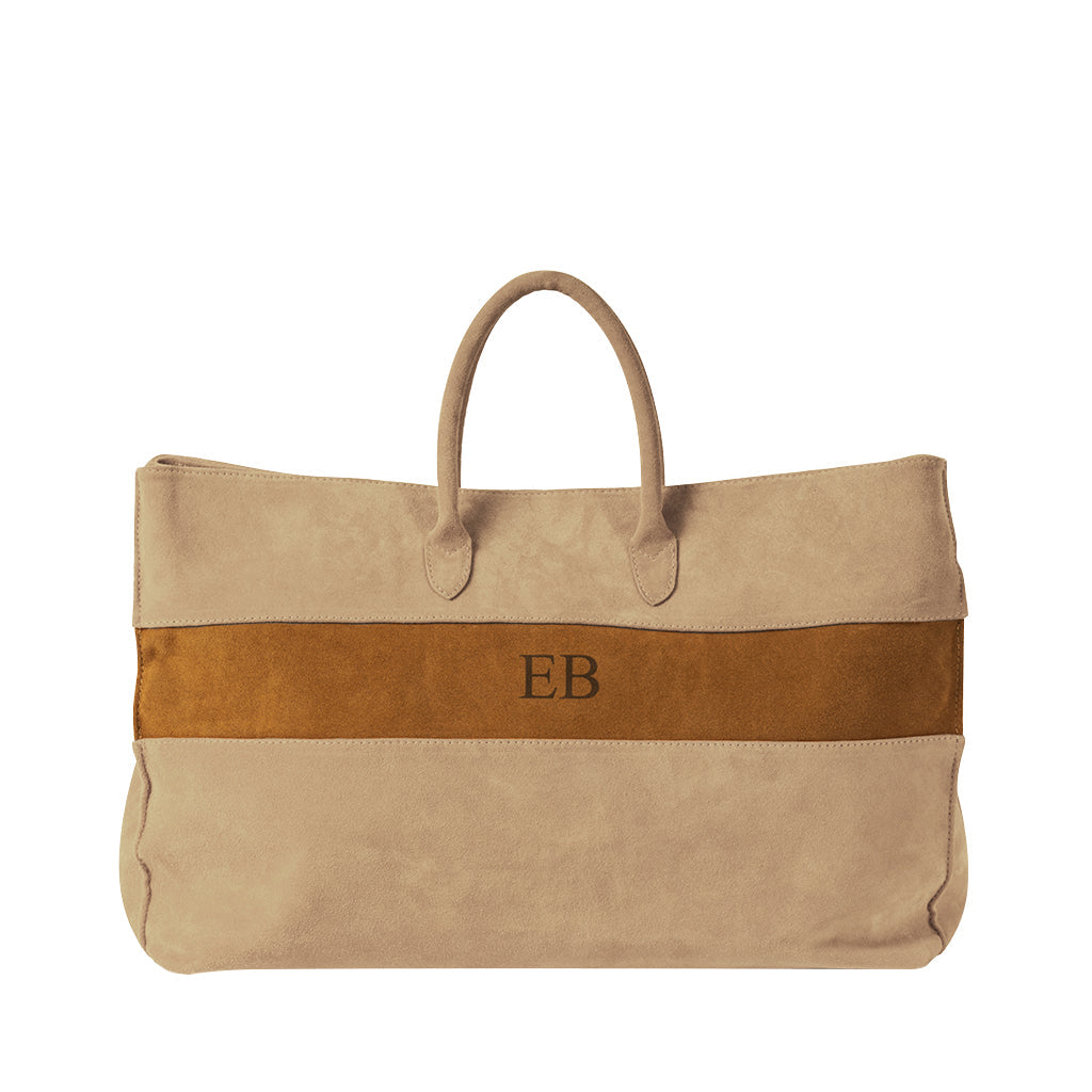 Beige leather tote bag with brown suede accent and EB monogram