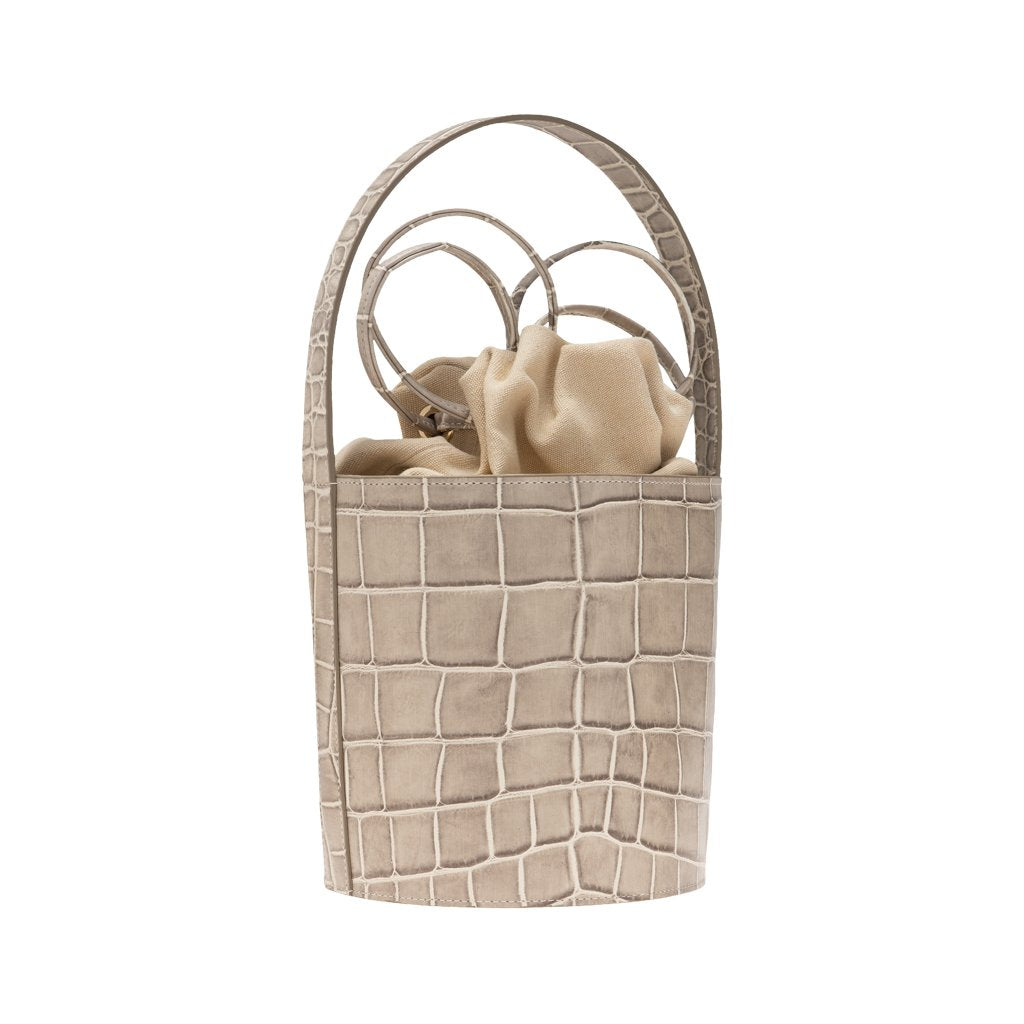 Beige crocodile-textured bucket handbag with round handles