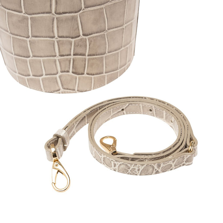 Grey crocodile-patterned leather handbag with detachable strap and gold clasps