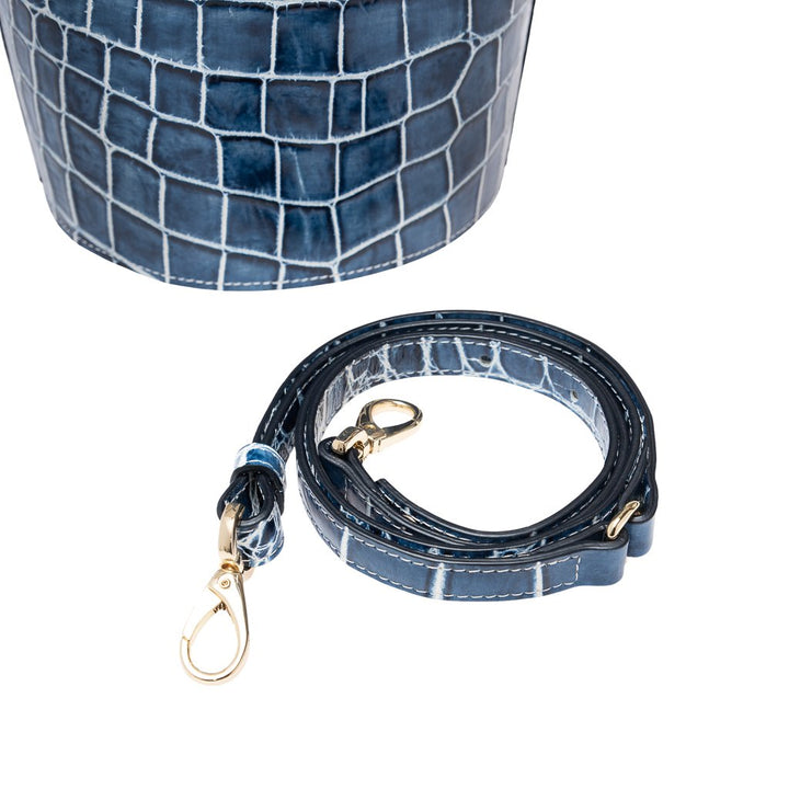Blue crocodile-patterned shoulder bag and strap with gold hardware