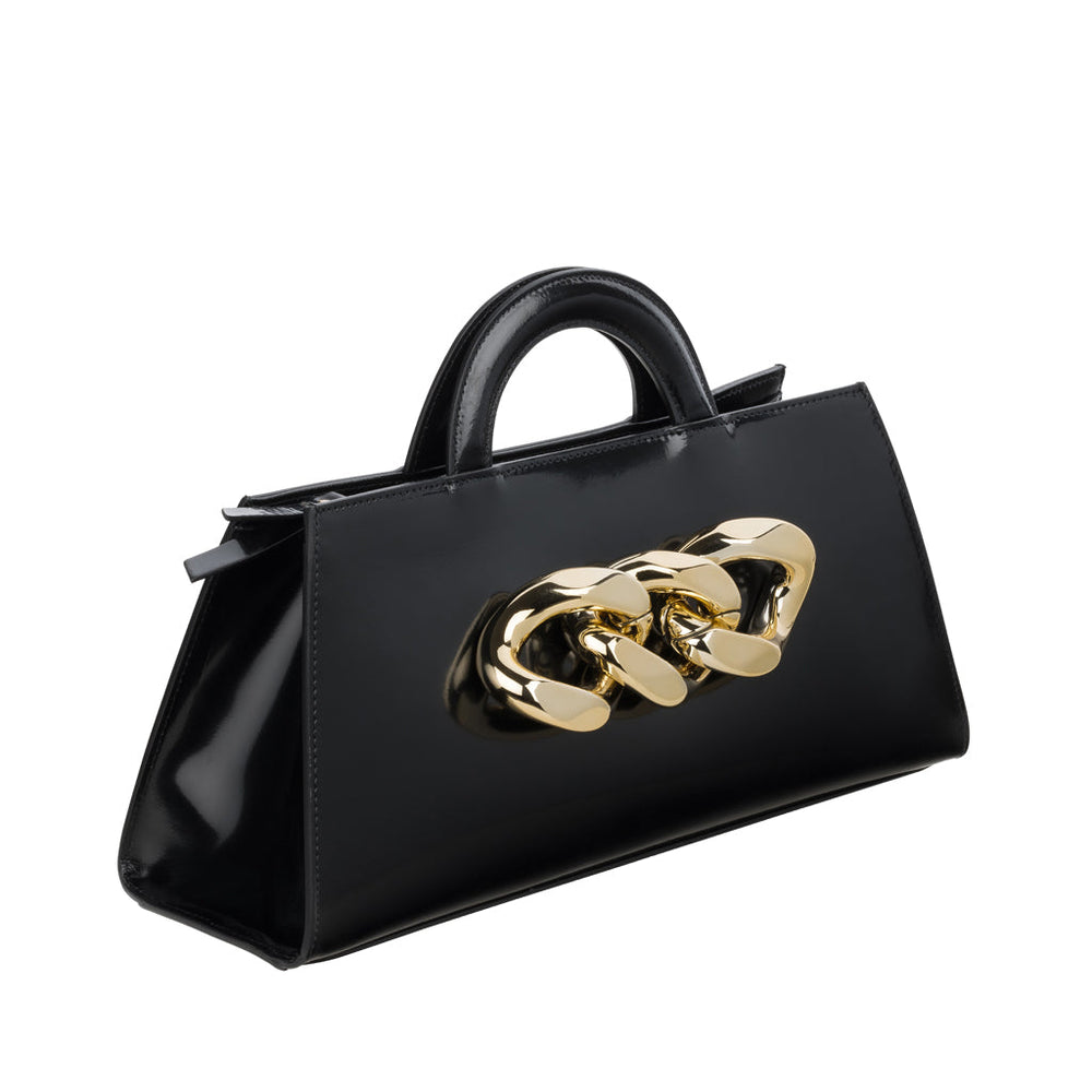 Black designer handbag with gold chain accent