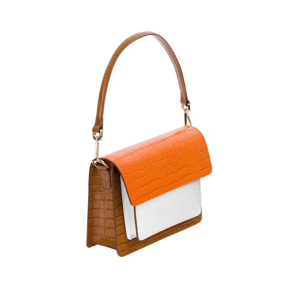 Stylish brown, white, and orange leather handbag with a top handle