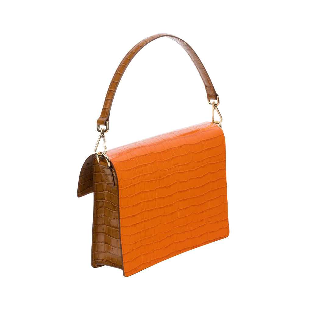 Orange and brown leather handbag with a crocodile texture
