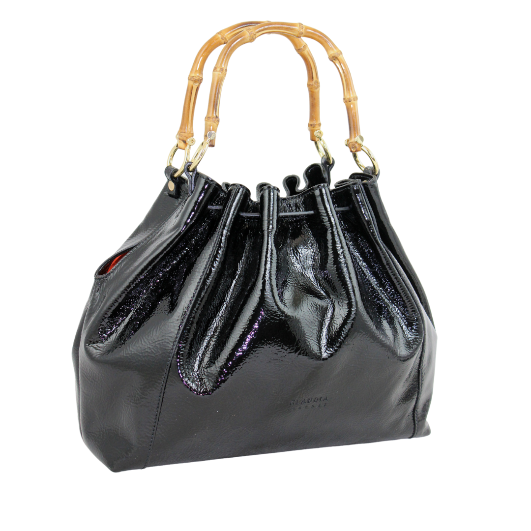 Black patent leather handbag with bamboo handles