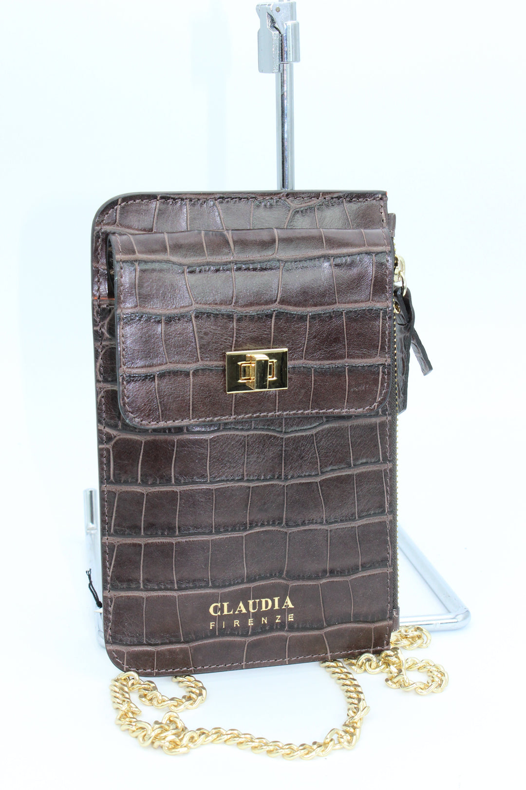 Brown crocodile-patterned leather crossbody bag with gold hardware and chain strap