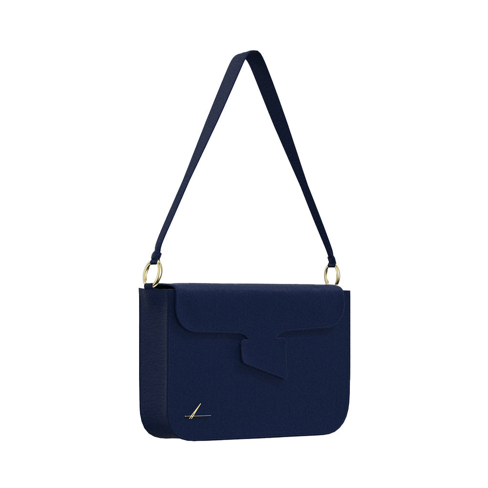 Navy blue leather crossbody bag with gold hardware and sleek modern design