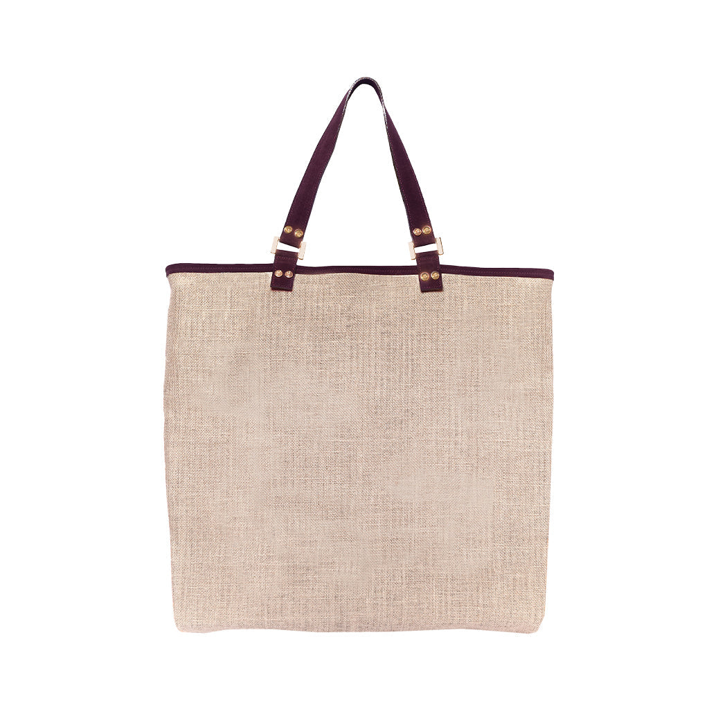Beige linen tote bag with dark brown leather handles
