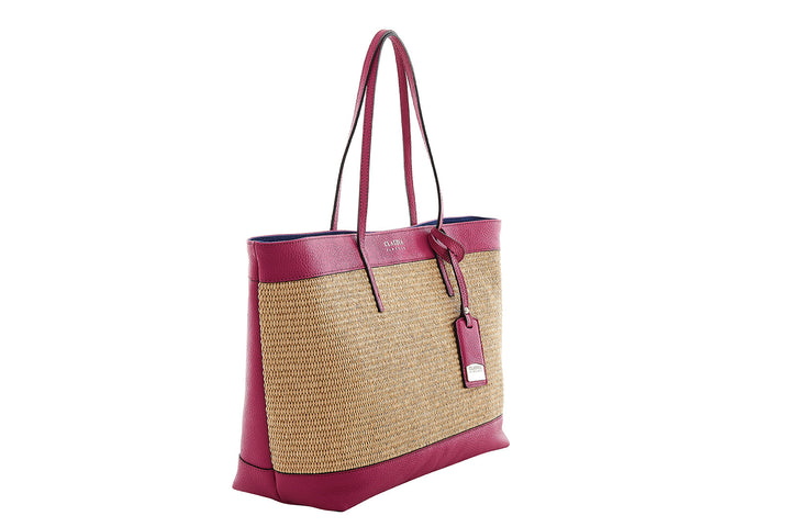 Stylish woven tote bag with red leather straps and accents