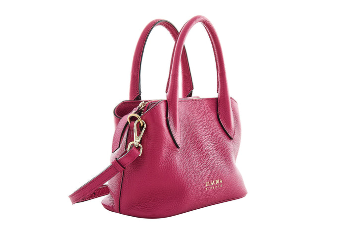 Bright pink leather handbag with gold hardware and Claudia branding