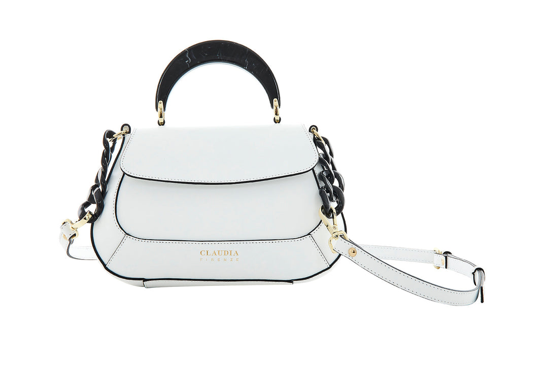 White designer handbag with black handle and detachable shoulder strap