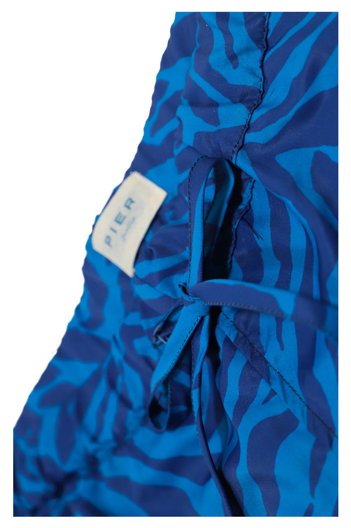 Close-up of blue zebra print drawstring swim trunks